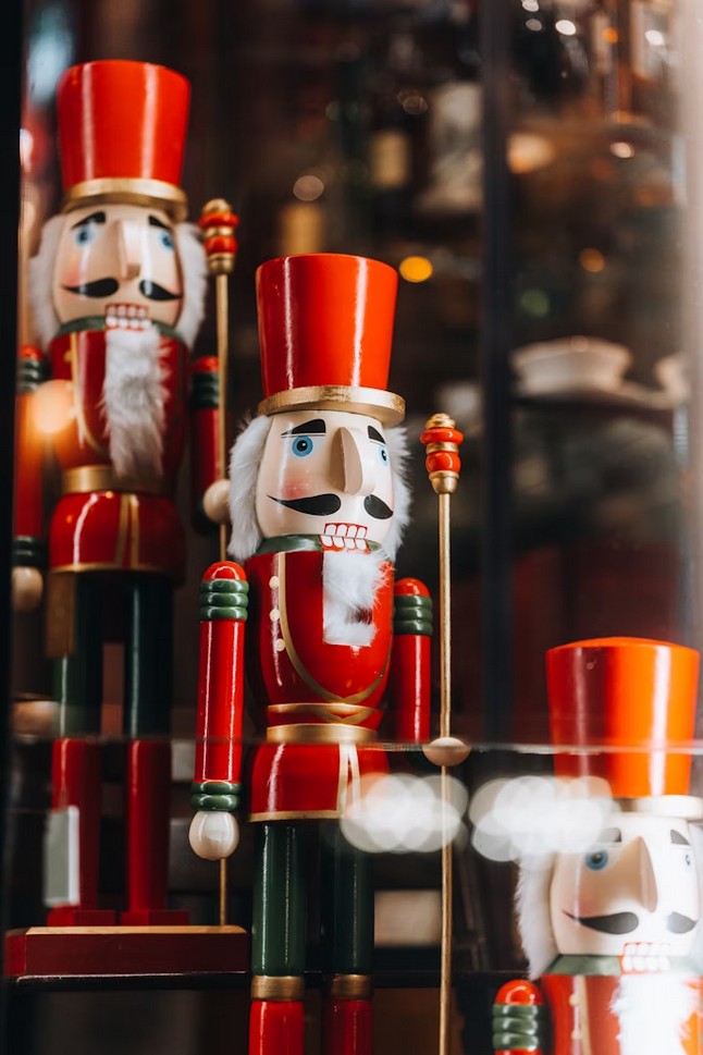 A group of nutcrackers sitting next to each other